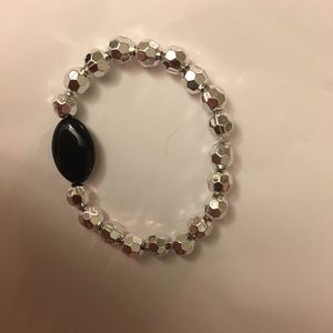 It’s bracelet is made of string